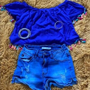 fringe shirt Blue shorts jewelry not included